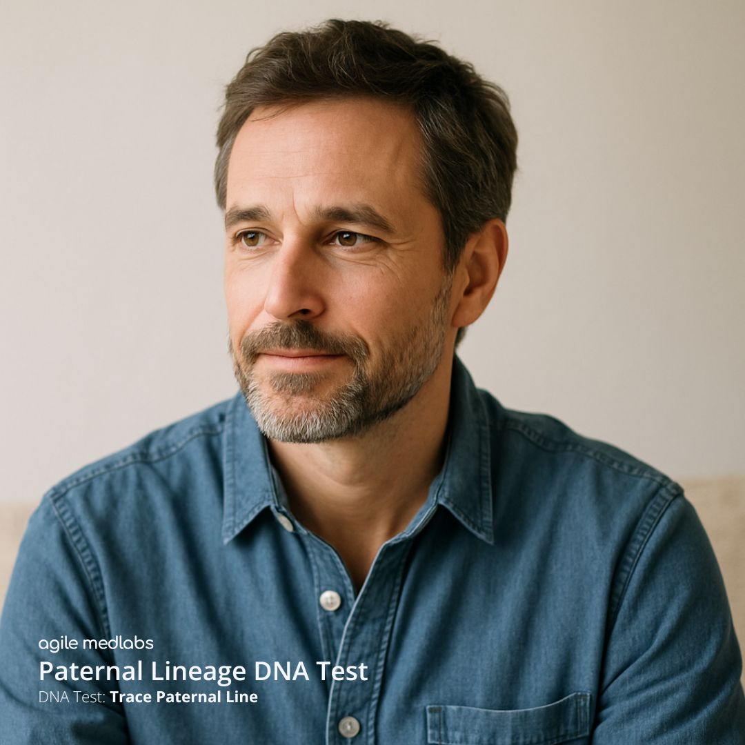 Adult male with contemplative or relaxed expression in natural light, used for paternal lineage DNA test card.