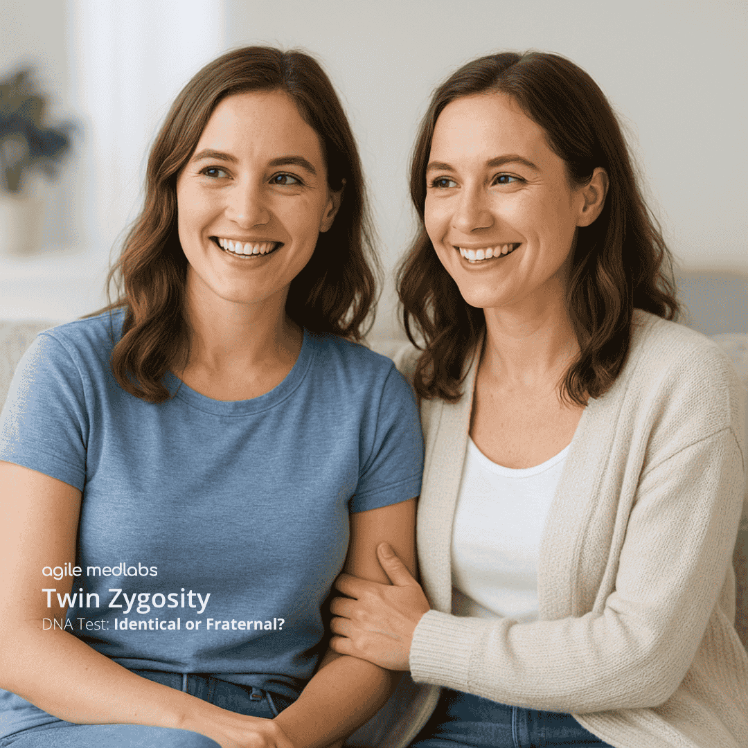 Two twin siblings sitting side-by-side, smiling — used for Twin Zygosity DNA Test service page.